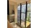 Modern glass-railed hallway overlooking the entryway at 2147 Briarwillow Ne Dr, Atlanta, GA 30345
