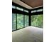 Open living space with large windows and wooded views at 2147 Briarwillow Ne Dr, Atlanta, GA 30345