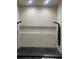Modern shower with frameless glass and rainfall shower head at 2147 Briarwillow Ne Dr, Atlanta, GA 30345