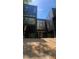 Modern black home with large windows and a sloped roof at 2147 Briarwillow Ne Dr, Atlanta, GA 30345