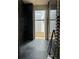 Walk-in wine cellar with dark marble tile and built-in racks at 2147 Briarwillow Ne Dr, Atlanta, GA 30345