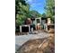 Modern home under construction with large windows at 2147 Briarwillow Ne Dr, Atlanta, GA 30345