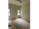 Spacious bedroom with light hardwood floors and large windows at 2147 Briarwillow Ne Dr, Atlanta, GA 30345