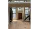 Bright entryway with hardwood floors and wooden staircase at 2147 Briarwillow Ne Dr, Atlanta, GA 30345