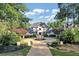 Grand estate home with circular driveway and manicured landscaping at 4317 Oglethorpe Nw Loop, Acworth, GA 30101