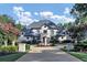 Grand home with a fountain and manicured landscaping at 4317 Oglethorpe Nw Loop, Acworth, GA 30101
