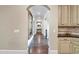 Elegant hallway with hardwood floors and a large ornate mirror at 4317 Oglethorpe Nw Loop, Acworth, GA 30101