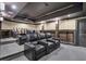Basement home theater with tiered seating and a projector at 4317 Oglethorpe Nw Loop, Acworth, GA 30101