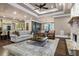 Open living room with a stone fireplace and hardwood floors at 4317 Oglethorpe Nw Loop, Acworth, GA 30101