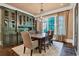 Bright dining room with built-in hutch and hardwood floors at 4317 Oglethorpe Nw Loop, Acworth, GA 30101