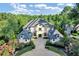 Luxury estate home with expansive driveway and mature trees at 4317 Oglethorpe Nw Loop, Acworth, GA 30101