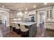 Gourmet kitchen with large island, granite countertops, and custom cabinetry at 4317 Oglethorpe Nw Loop, Acworth, GA 30101