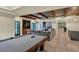 Finished basement with pool table, fireplace, and bar area at 4317 Oglethorpe Nw Loop, Acworth, GA 30101