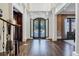 Two-story entry with decorative iron doors and hardwood floors at 4317 Oglethorpe Nw Loop, Acworth, GA 30101