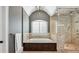 Spa-like bathroom with soaking tub, walk-in shower, and gray walls at 4317 Oglethorpe Nw Loop, Acworth, GA 30101