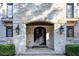 Elegant entryway with arched stone details and ornate double doors at 4317 Oglethorpe Nw Loop, Acworth, GA 30101
