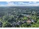 Community overview showcasing homes, tennis courts, and lush greenery at 4317 Oglethorpe Nw Loop, Acworth, GA 30101