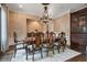 Formal dining room features a chandelier and built-in cabinetry at 4317 Oglethorpe Nw Loop, Acworth, GA 30101
