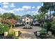 Grand estate home with circular driveway and lush landscaping at 4317 Oglethorpe Nw Loop, Acworth, GA 30101