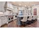 Gourmet kitchen with custom cabinetry, large island, and high-end appliances at 4317 Oglethorpe Nw Loop, Acworth, GA 30101