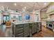 Large kitchen island with granite countertops and stainless steel appliances at 4317 Oglethorpe Nw Loop, Acworth, GA 30101