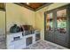 Outdoor kitchen features a grill, stone countertops, and a mini-fridge at 4317 Oglethorpe Nw Loop, Acworth, GA 30101