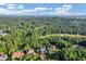 Expansive aerial view of upscale homes and golf course at 4317 Oglethorpe Nw Loop, Acworth, GA 30101