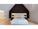 Spacious primary bedroom with a large bed, nightstands, and access to a private balcony at 3206 Arden Rd, Atlanta, GA 30305