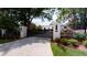Grand entrance with automatic gate and manicured landscaping at 3206 Arden Rd, Atlanta, GA 30305