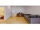Spacious bedroom with hardwood floors, daybed, and en-suite bathroom at 3206 Arden Rd, Atlanta, GA 30305
