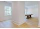 Bright dining room with hardwood floors and a large dining table at 3206 Arden Rd, Atlanta, GA 30305