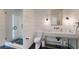 Modern bathroom with marble vanity, herringbone floors, and glass shower at 3206 Arden Rd, Atlanta, GA 30305