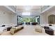 Grand two story great room with sliding doors leading to an outdoor patio at 3206 Arden Rd, Atlanta, GA 30305