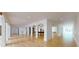 Spacious basement with hardwood floors, arched doorways, and plenty of natural light at 3206 Arden Rd, Atlanta, GA 30305