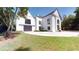 White modern home with large windows and driveway at 3206 Arden Rd, Atlanta, GA 30305