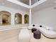 Open concept great room with two story ceilings and access to outdoor patio at 3206 Arden Rd, Atlanta, GA 30305