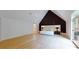 Large main bedroom with hardwood floors, high ceilings, and access to private bath at 3206 Arden Rd, Atlanta, GA 30305