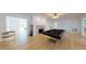 Basement game room with pool table, fireplace and hardwood floors at 3206 Arden Rd, Atlanta, GA 30305