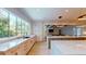 Modern kitchen with large island and window at 3206 Arden Rd, Atlanta, GA 30305