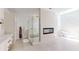 Spa-like bathroom with a freestanding tub, walk-in shower, and marble finishes at 3206 Arden Rd, Atlanta, GA 30305