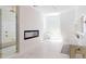 Luxurious bathroom with soaking tub, walk-in shower, and fireplace at 3206 Arden Rd, Atlanta, GA 30305