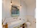 Elegant bathroom with marble vanity, gold fixtures, and white subway tile at 3206 Arden Rd, Atlanta, GA 30305