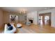 Open living space with hardwood floors, fireplace and views into other rooms at 3206 Arden Rd, Atlanta, GA 30305
