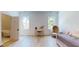 Bright bedroom with hardwood floors, a daybed, and access to a bathroom at 3206 Arden Rd, Atlanta, GA 30305
