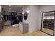 Custom walk-in closet with an island and mirror at 3206 Arden Rd, Atlanta, GA 30305