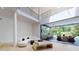 Stunning two-story great room with hardwood floors and access to the backyard at 3206 Arden Rd, Atlanta, GA 30305