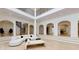 Two story great room with curved sectional sofa and access to outdoor patio at 3206 Arden Rd, Atlanta, GA 30305