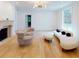 Relaxing living room with hardwood floors, fireplace, and modern furniture at 3206 Arden Rd, Atlanta, GA 30305