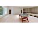 Spacious game room with foosball table and large windows at 3206 Arden Rd, Atlanta, GA 30305
