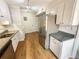Kitchen features stainless steel refrigerator and hardwood floors at 3266 Henderson Mill Rd # C, Atlanta, GA 30341